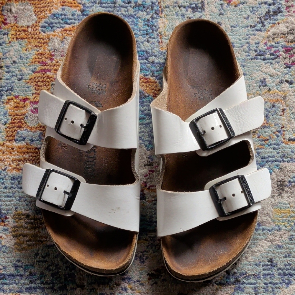 Birkenstock White Sandals with Black Buckles